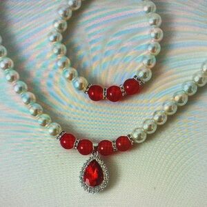 Elegant Pearl and Red Gemstone Bracelet